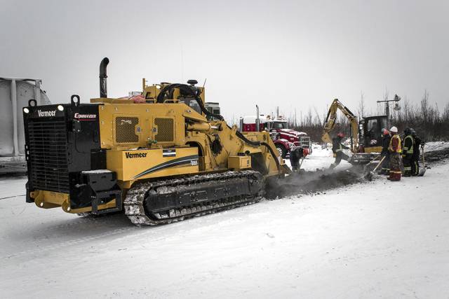 Schwere Baufahrzeuge im Schnee