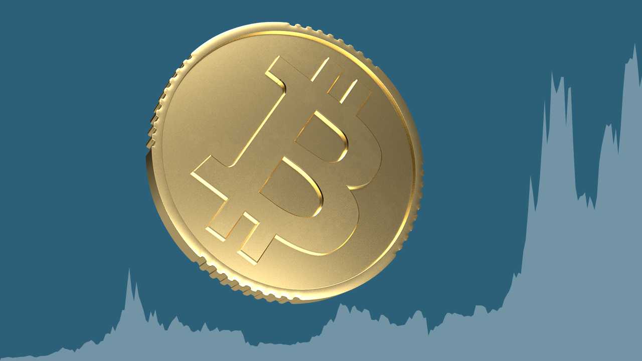 Bitcoin-Münze vor einem Graphen, der steigende Kurse anzeigt.