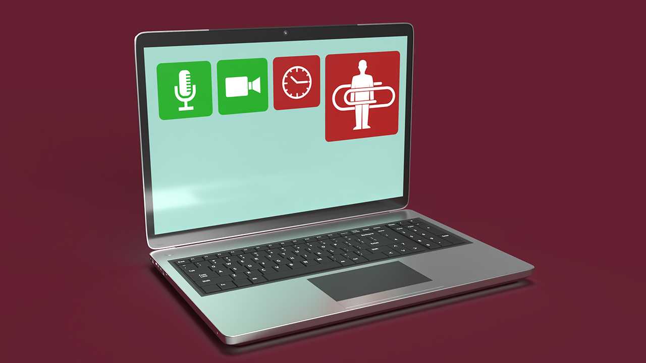 Laptop mit Mikro, Kamera, Uhr und Mensch zwischen Büroklammer als App auf dem Bildschirm