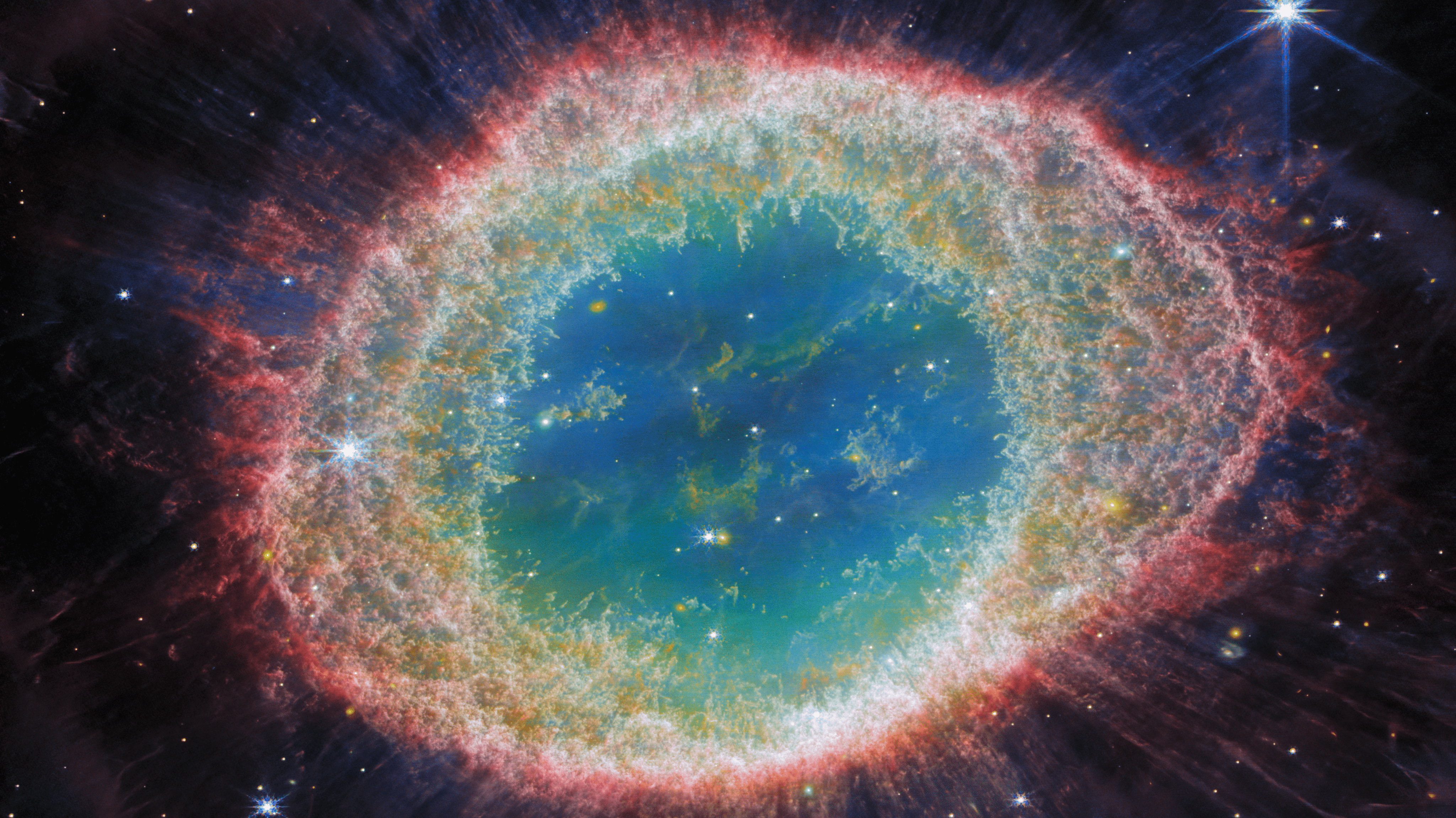 Ringnebel aufgenommen mit dem James-Webb-Weltraumteleskop. Das Bild zeigt die schillerndsten Farben. 