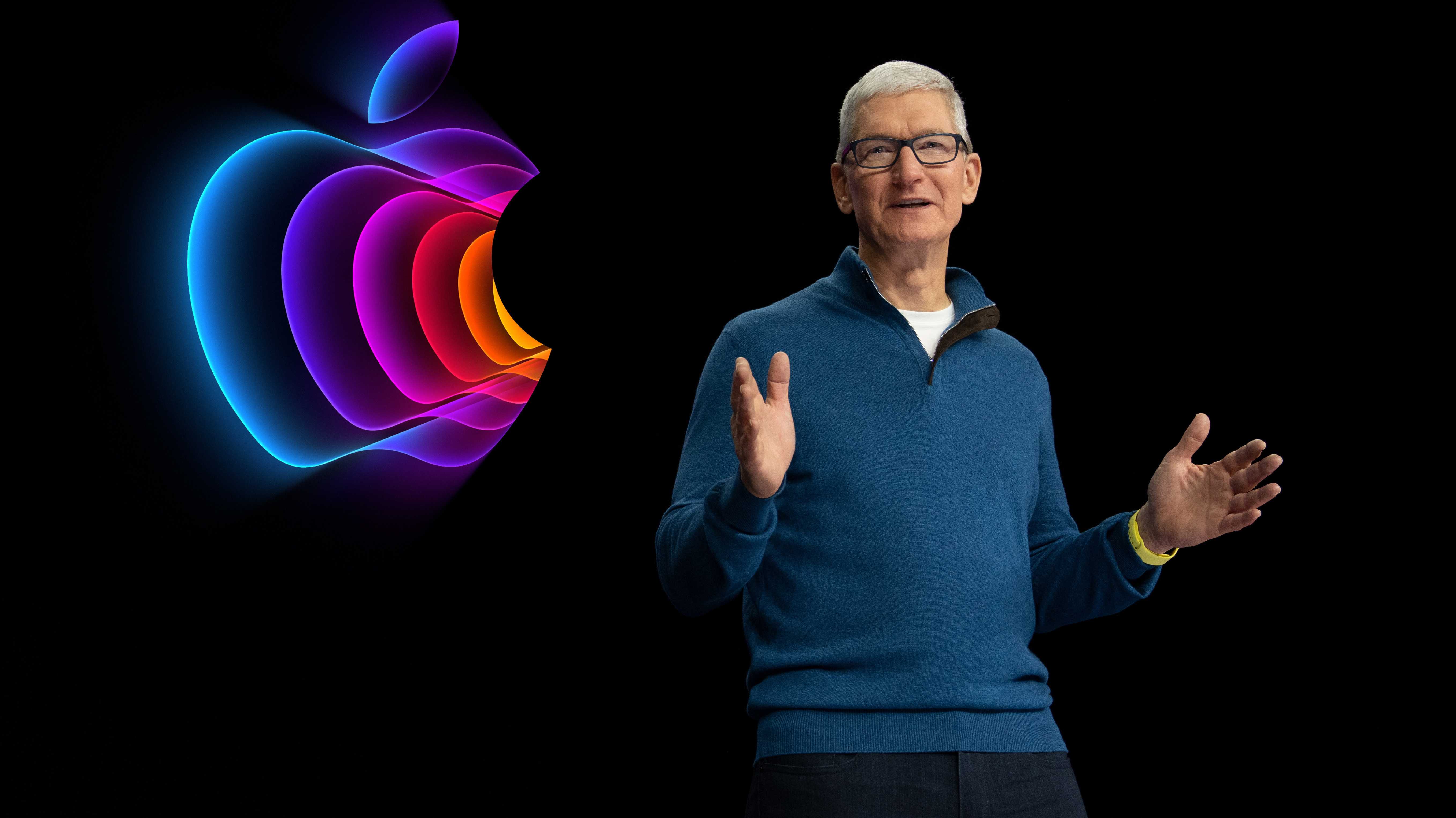 Tim Cook, dahinter ein buntes Apple-Logo