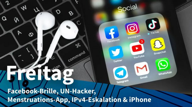 Handy mit Apps auf Notebook neben Headset
