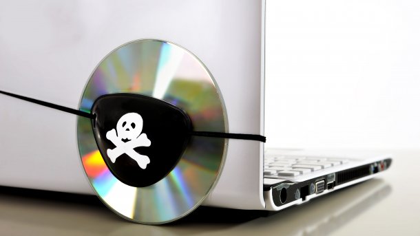 Pirate,Eye,Patch,On,Cd,Or,Dvd,Disk,And,Computer