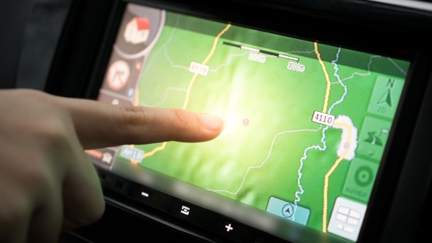 Using,Gps,In,Car,While,Travel.