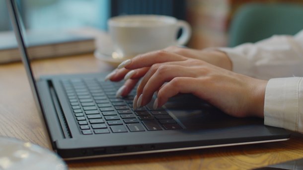 Close,Up,Of,Woman,Hands,Typing,On,Laptop.,Woman,Working