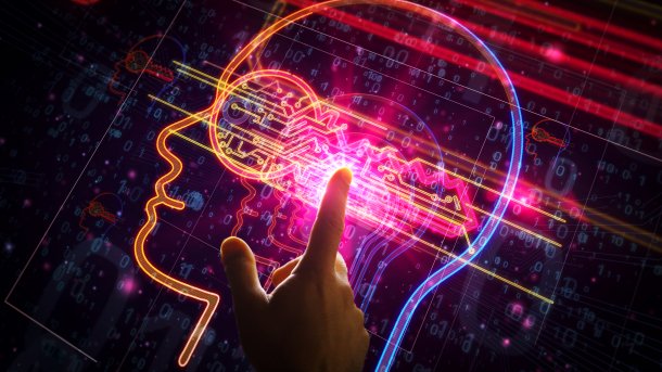 Elektronischer Finger zeigt auf Gehirn im Bild eines Kopfes