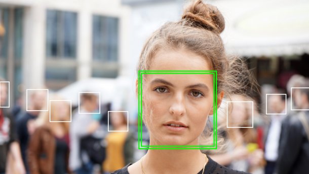 Young,Woman,Picked,Out,By,Face,Detection,Or,Facial,Recognition
