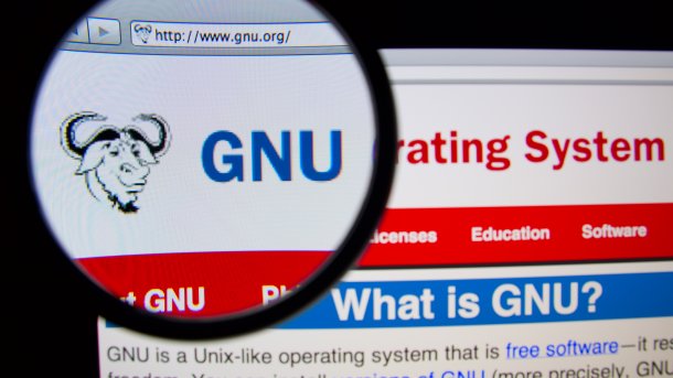 Website des GNU-Projekts, das GNU-Logo wird unter die Lupe genommen