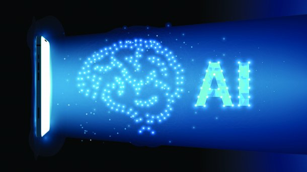 KI-Schriftzug und ein iPhone