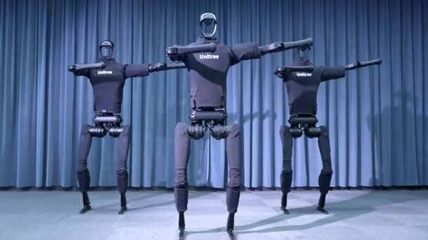 Das Bild zeigt drei tanzende Unitree H1 Roboter.