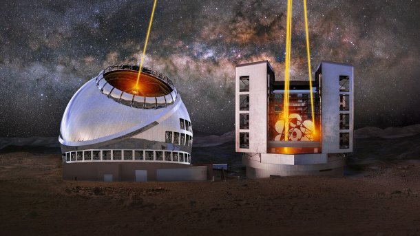 Zwei riesige Teleskope mit aktivierten Laserstrahlen nebeneinander