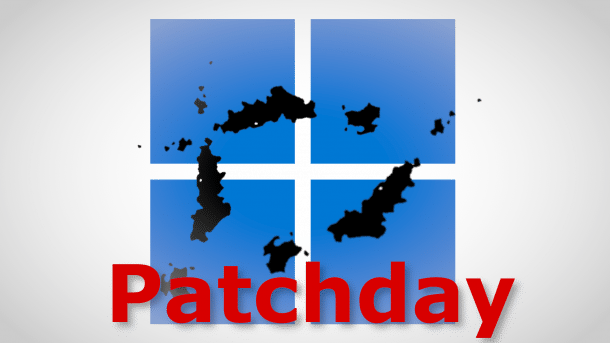 Microsoft-Logo mit Rissen und der Aufschrift "Patchday"