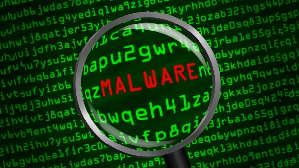 Magnifying,Glass,Enlarging,Malware,In,Computer,Machine,Code