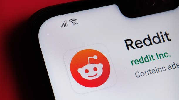 Reddit logo on smartphone screen