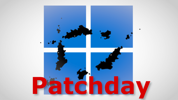 Windows logo with stains and the inscription "Patchday"