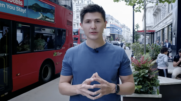 Synthesia avatar with hands, placed in London