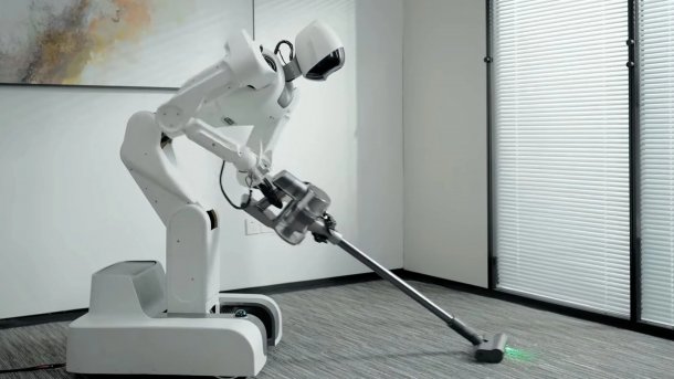 Astribot S1 robot vacuuming.