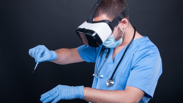 Hand points to health data room