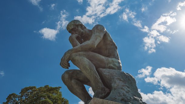Sculpture of a man deep in thought