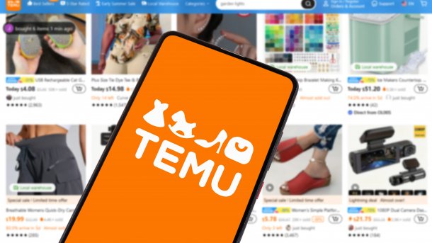 Handy mit Temu App vor einem Bildschirm