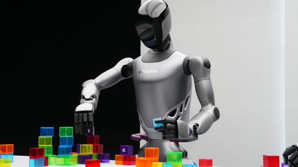 The humanoid robot GR-2 from Fourier sorts colored objects.