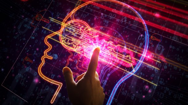 A glowing head graphic on which a finger taps