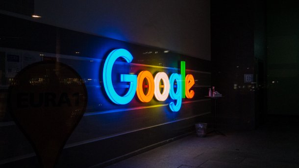 Google neon sign in the dark.