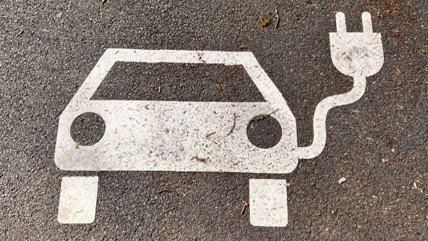 Symbol on a parking lot for electric cars.