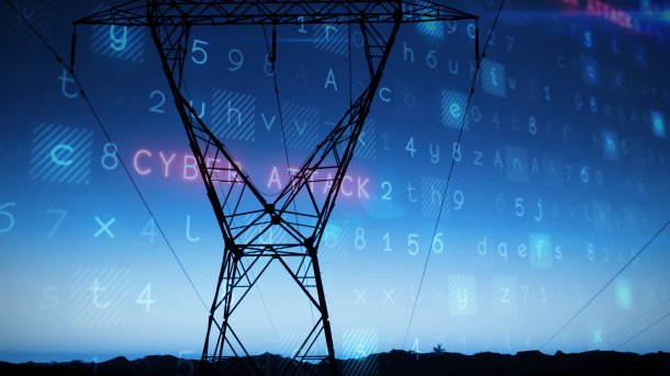 Pole of an overland power line with stylized background and the visible words "Cyber Attack".