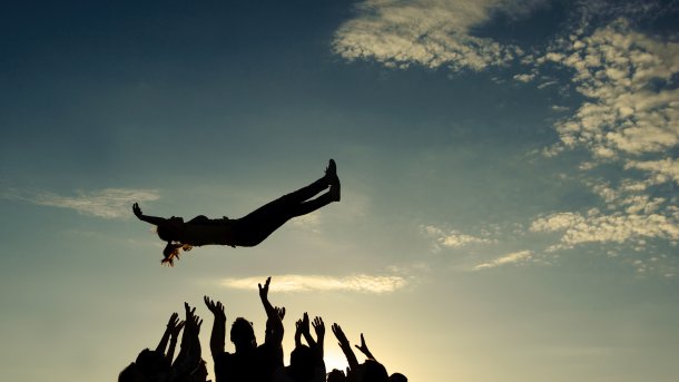 Group,Throwing,Girl,In,The,Air