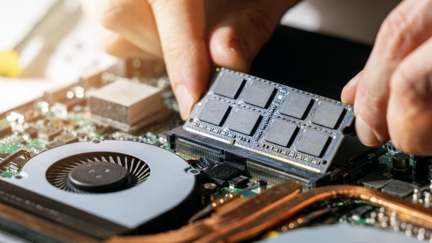 Technician,Installing,Ram,Memory,Module,In,Laptop,Motherboard.,Computer,Upgrade