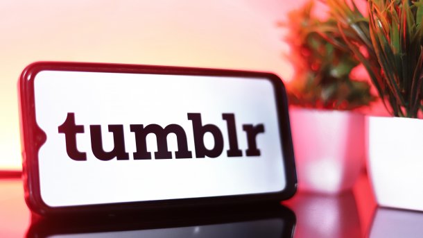 Tumblr logo on a smartphone placed on a table.