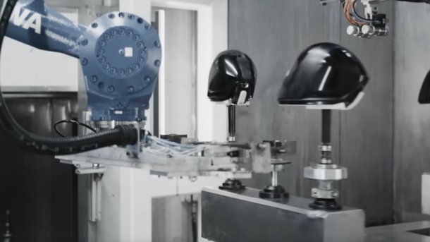 Robot produces visor for Figure 03.