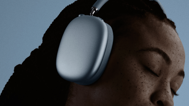 User with AirPods Max