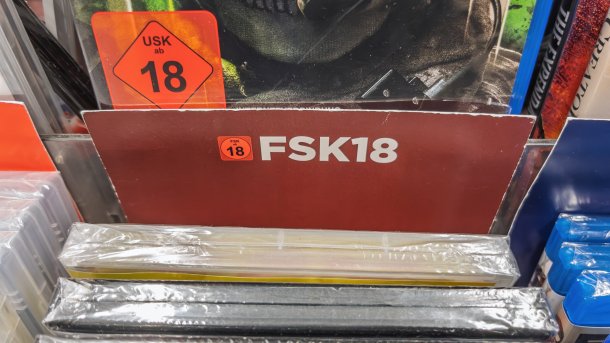 Video games with the USK18 symbol are on display in a store 