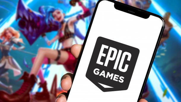 The Epic Games Store logo is displayed on a smartphone.
