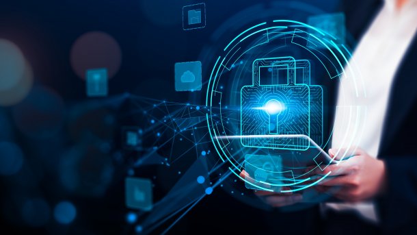 Woman in suit with tablet in hand 