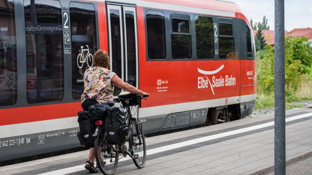 Tangermuende,,Germany,-,July,2014:,A,Woman,Cyclist,Going,With