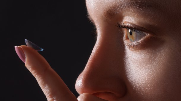 Woman,Puts,On,Contact,Lenses,For,Vision,Close-up,On,A