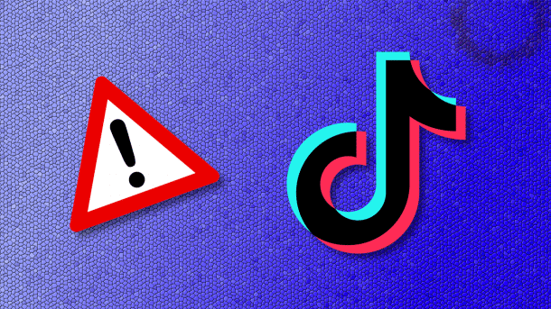 Achtung-Schild neben TikTok-Logo