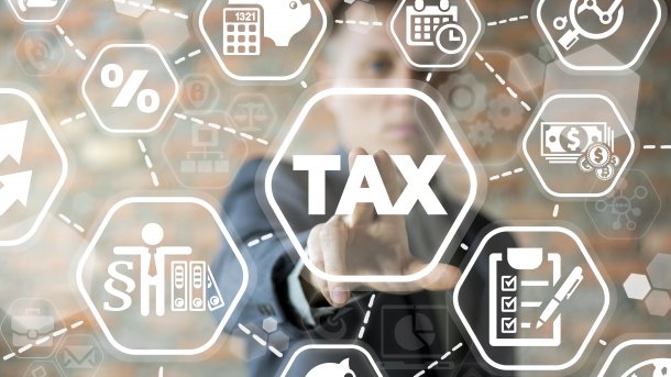 Mehrere Symbole rund um Steuern. 