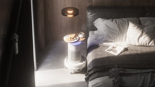 Saugroboter mit Tablett am Bett