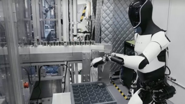 Tesla's Optimus Bot sorts parts.