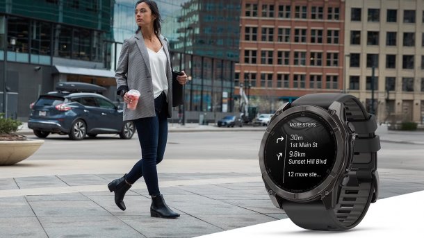 Google Maps on Garmin watch next to a walking woman