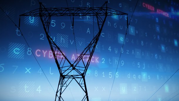 Pole of an overland power line with stylized background and the visible words "Cyber Attack".