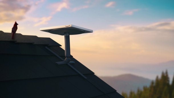 An antenna with the Amazon logo on a rooftop