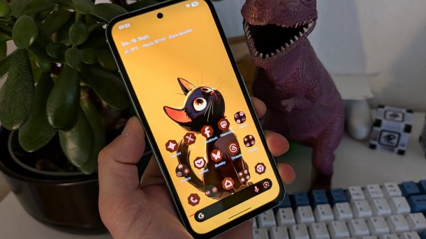 Photo of smartphone with Android 16 QPR 2 Beta in hand