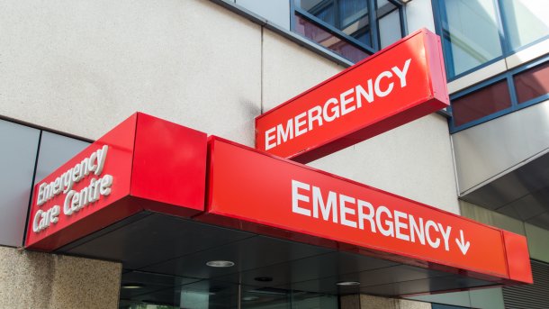 Several red signs with the word "Emergency"
