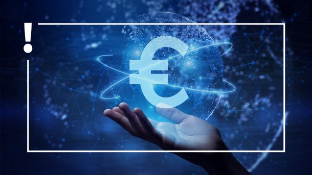 Hand with glass ball containing a Euro sign