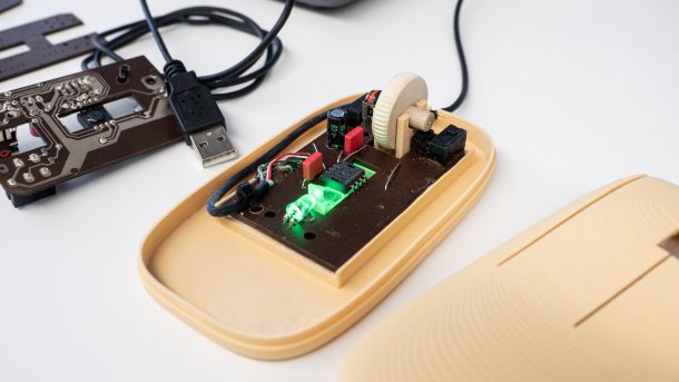 Largely biodegradable wooden mouse, open